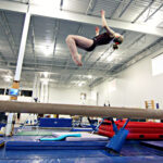 Back tuck on beam Amy