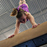 Handstand on beam Bella